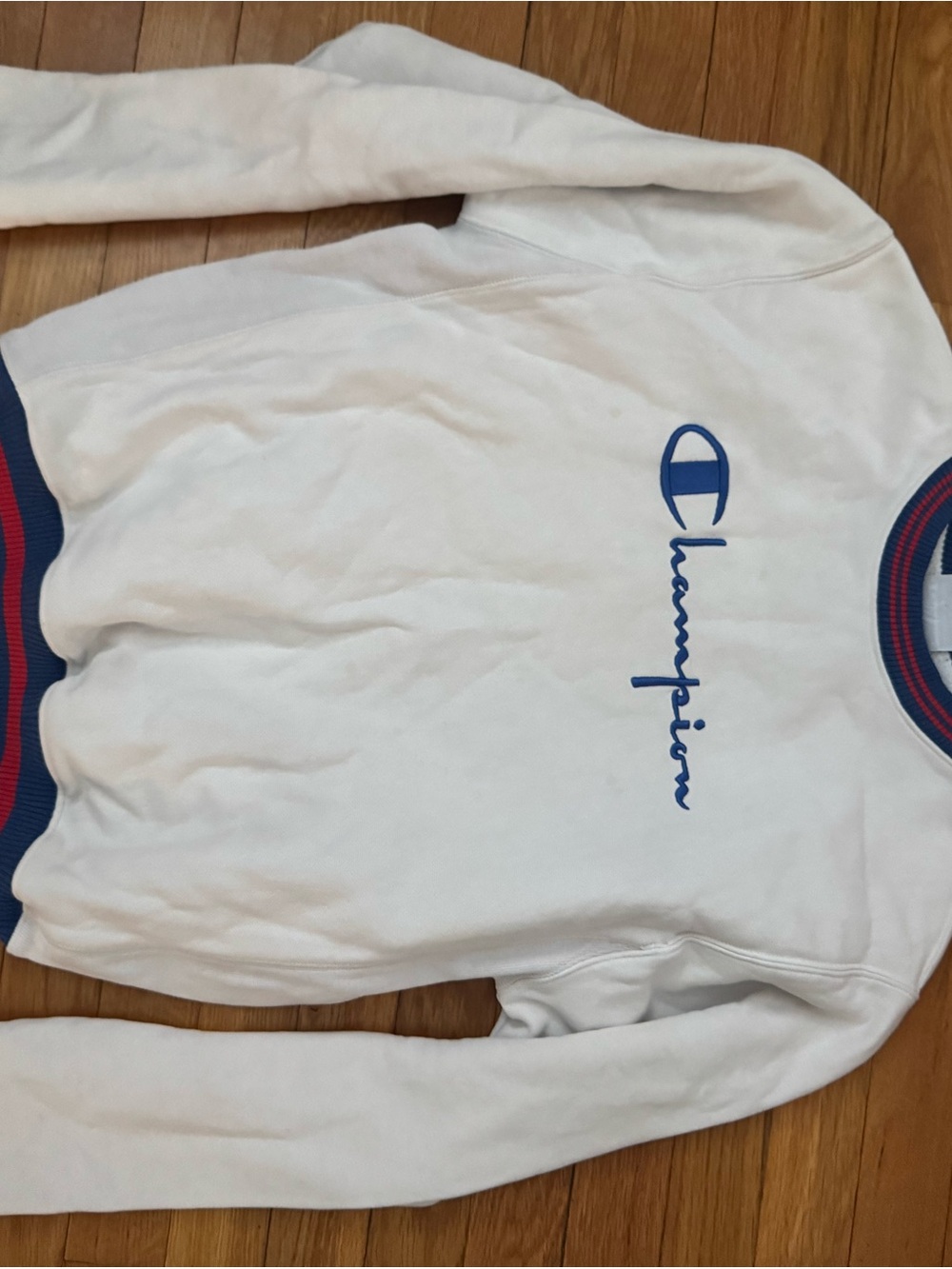 Champion Off-White Crewneck Sweatshirt with Blue Script Logo